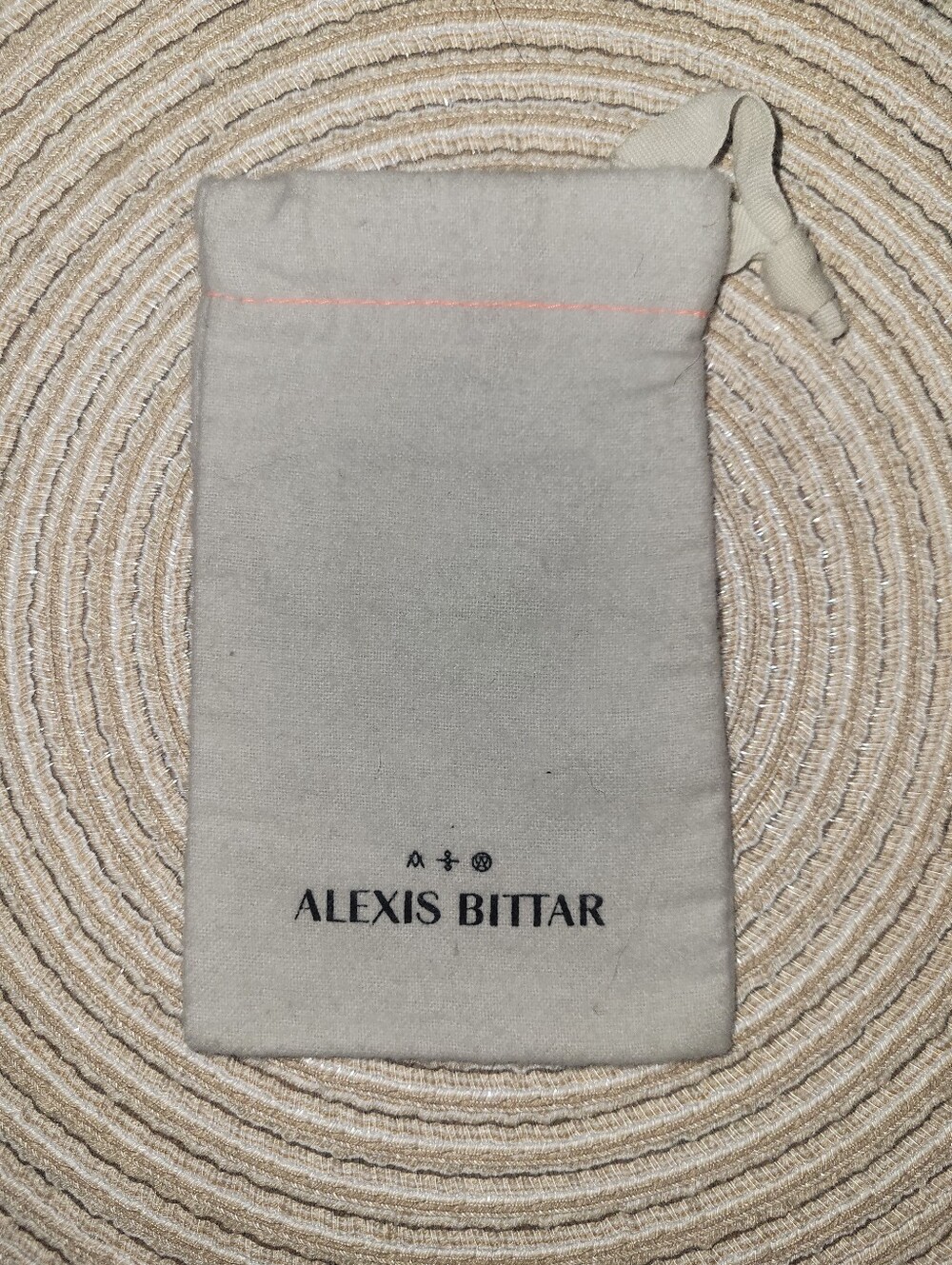 Alexis Bittar Beige Drawstring Jewelry Pouch with Logo